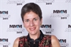 Elizabeth Turcotte of Bristol-Myers Squibb collects a Gold Award for Orencia