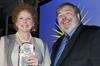 Dorothy Philips, the first woman to run a medical advertising agency, accepts her award from MAHF incoming chairman and emcee, Jay Carter of AbelsonTaylor
