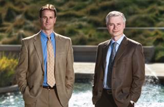 Pfizer's John Miles (left) with Dominique Monnet of Amgen Pfizer's John Miles (left) with Dominique Monnet of Amgen